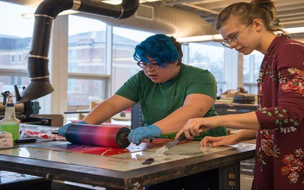 students in printmaking facility